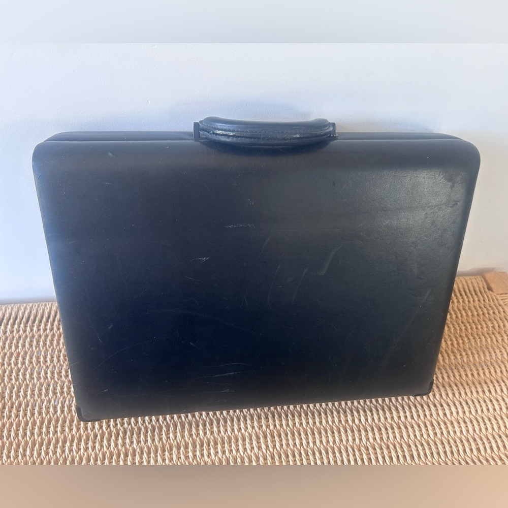 Tumi Black Hard Shell Briefcase